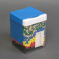 Dose mit  verschiedenen Kunststoffgranulaten