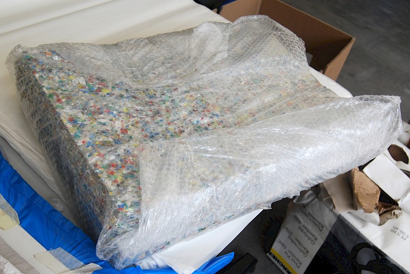 Platte aus Kunststoffabfall