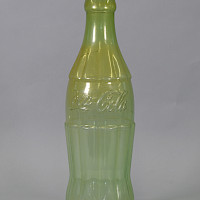 Spardose in Form einer Coca Cola Flasche